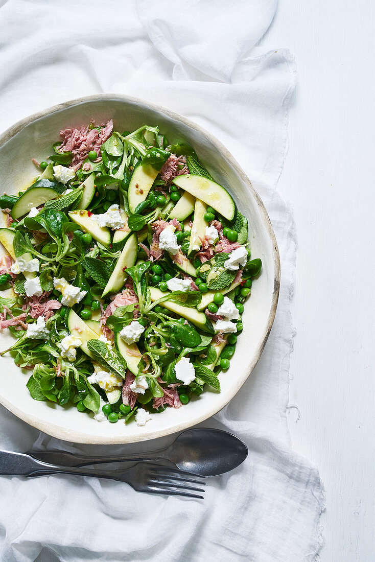 Courgette, pea, ham hock and goat's cheese salad