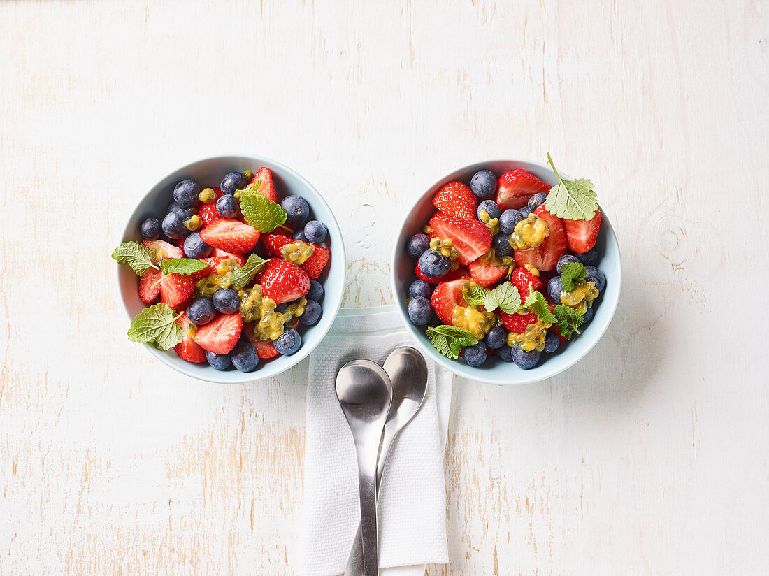 A summer breakfast with strawberries and blueberries