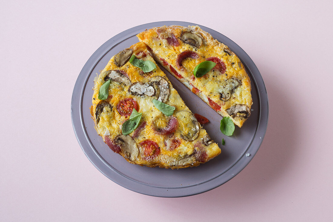 vegetables frittata with mushrooms, salami and tomatoes (keto cuisine)