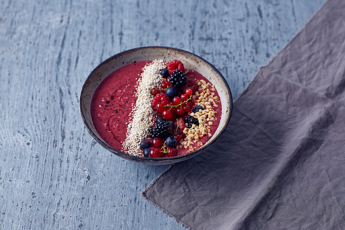 A berry vanilla bowl with kefir and puffed amaranth
