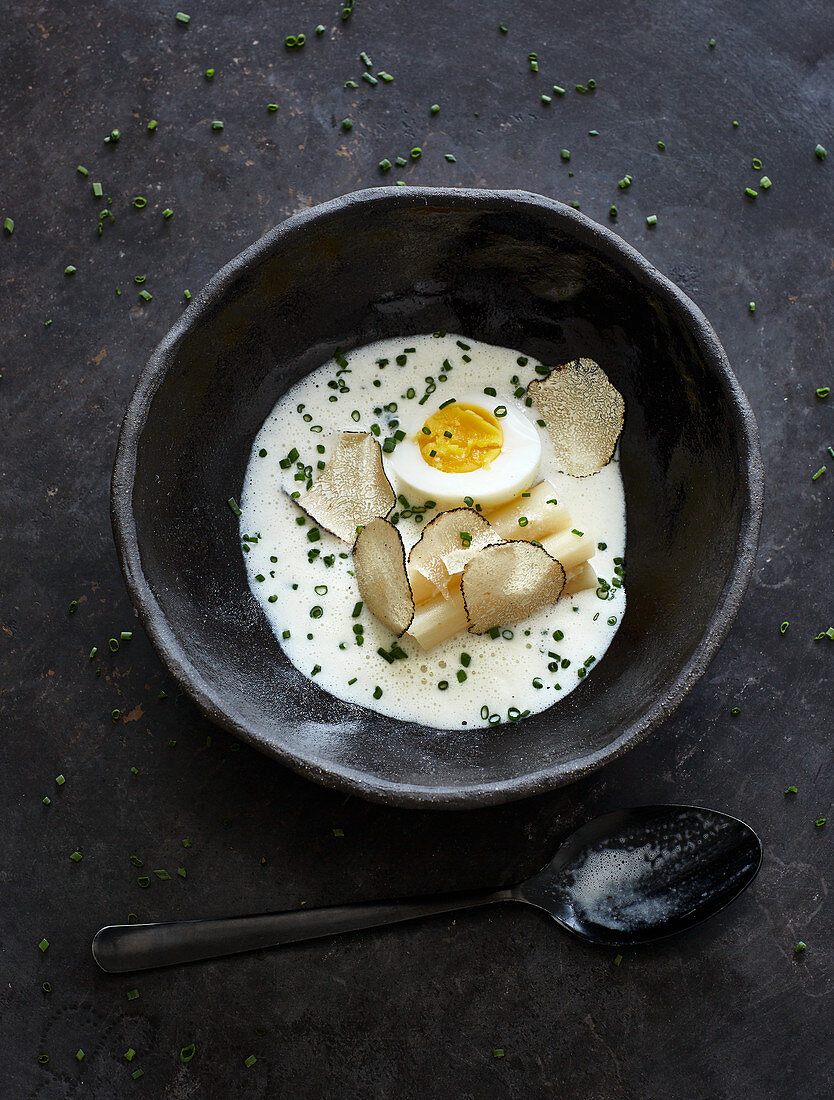 Black salsify soup with soft-boiled egg and truffles