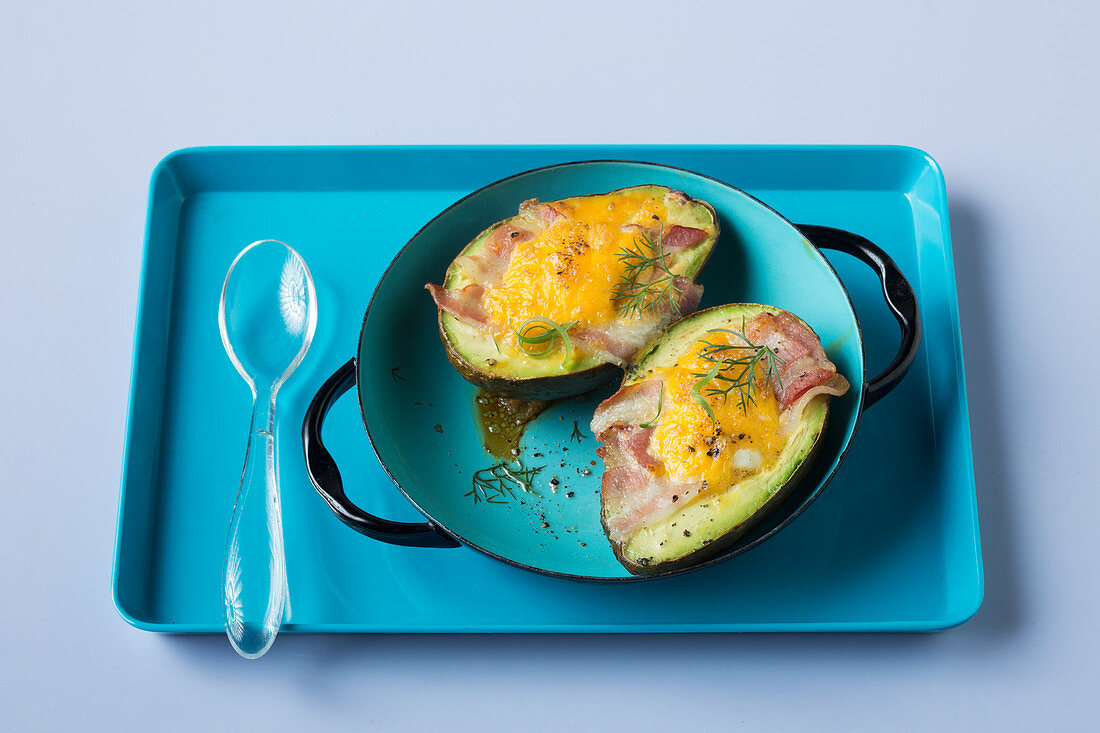 Avocado breakfast eggs with bacon (keto cuisine)