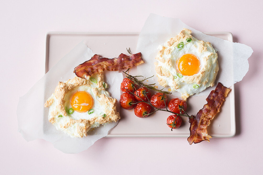Eggs on 'clouds' with oven-roasted tomatoes and bacon (keto cuisine)