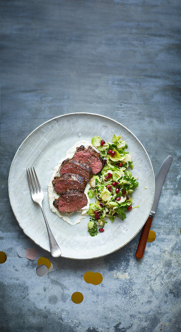 Seared venison with sprout and apple slaw