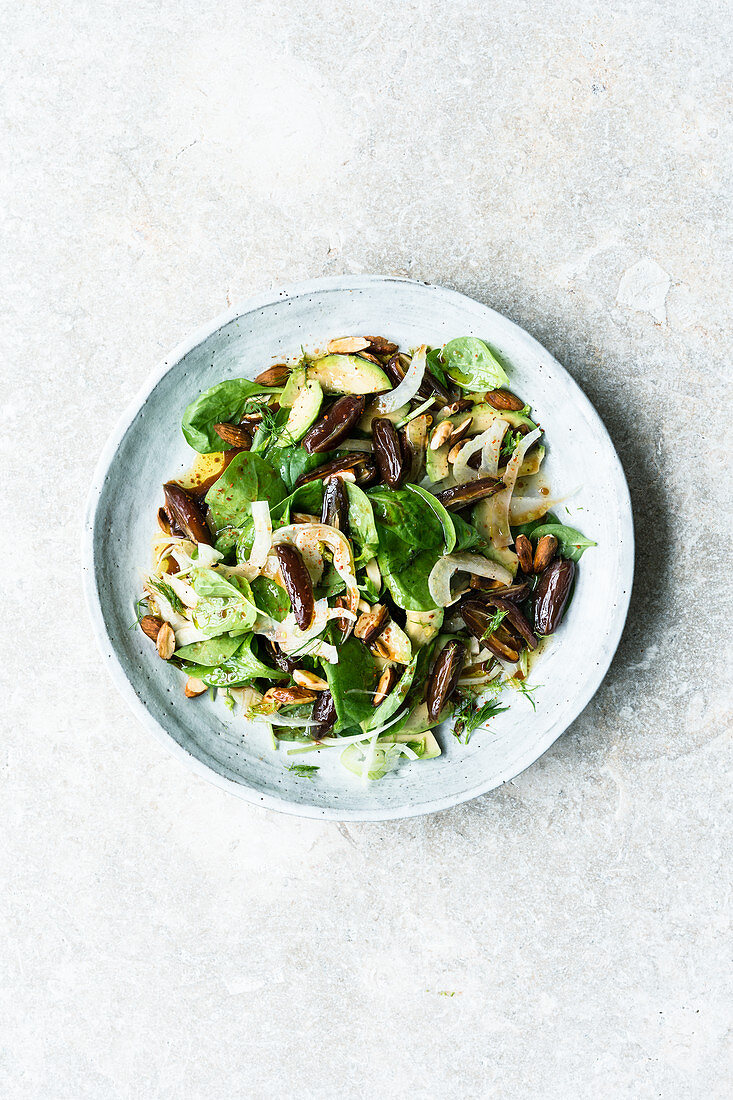 Israeli spinach salad with dates and avocado