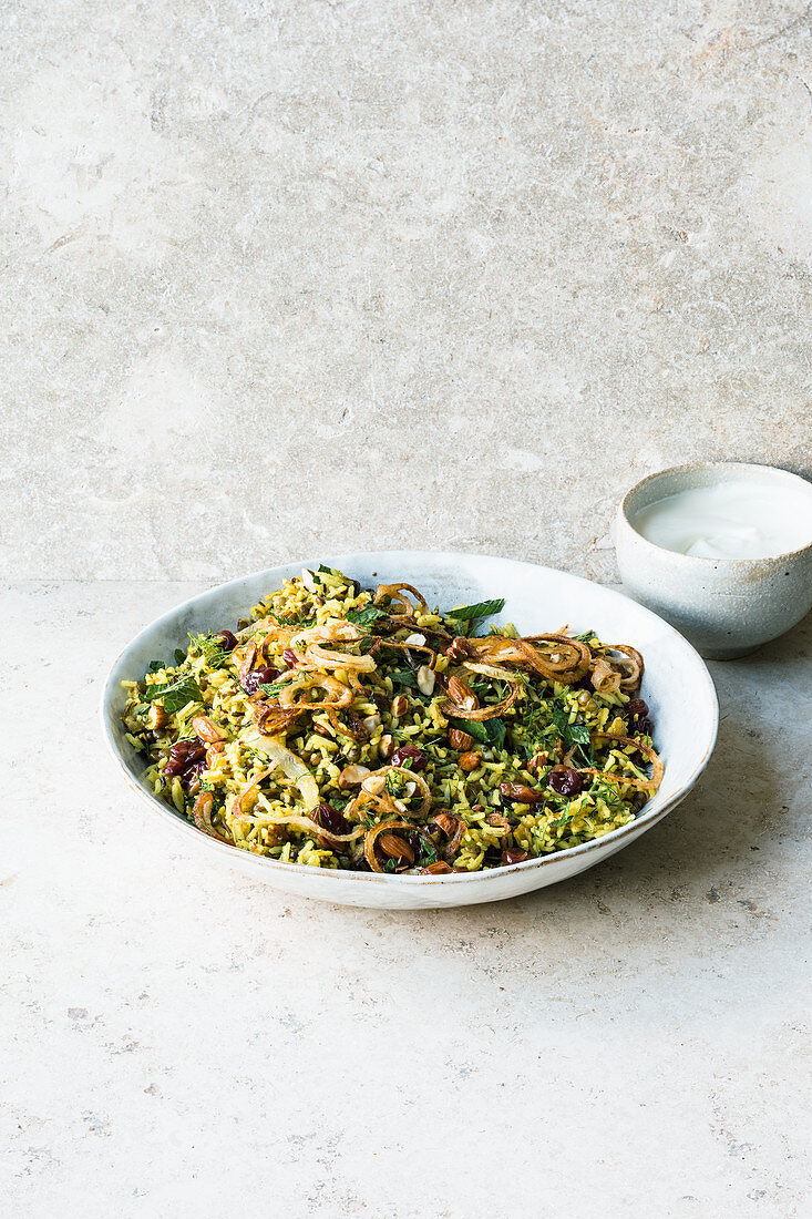 Israeli mejadra with green puy lentils and fried cherries