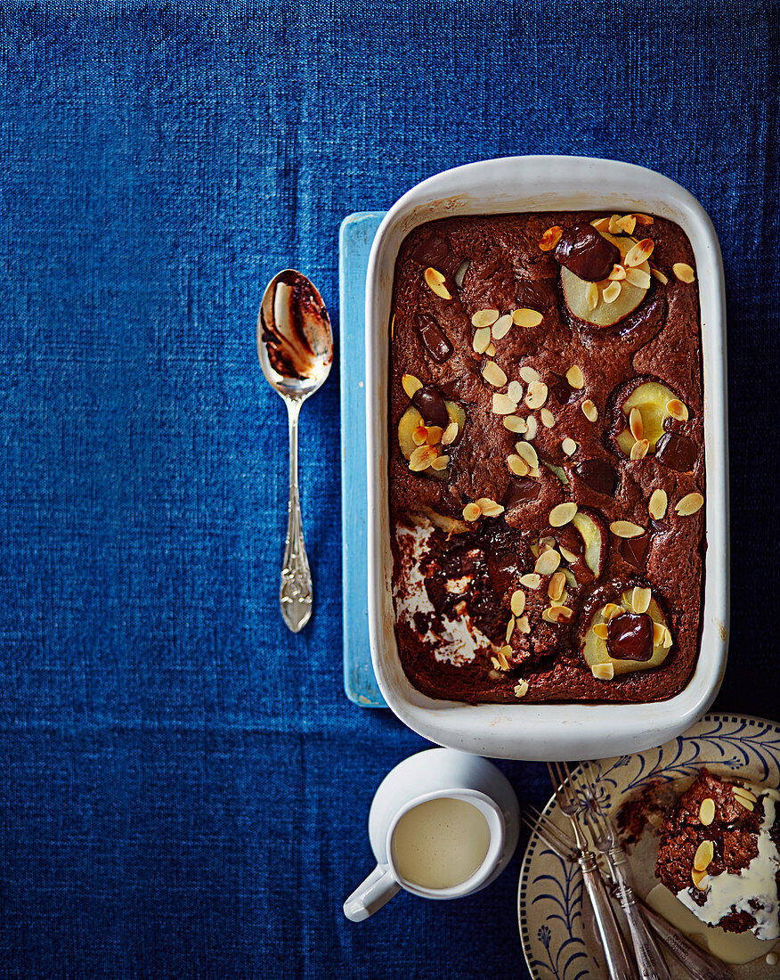 Baked chocolate pudding with pears and almonds