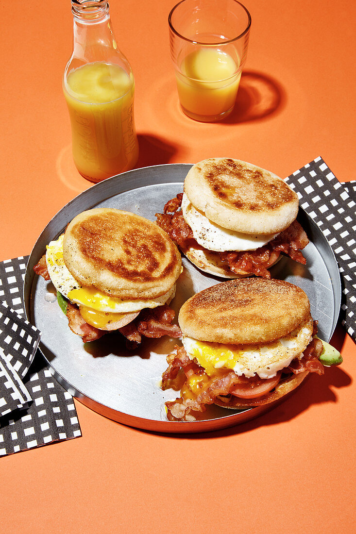Fried egg breakfast burgers with bacon and avocado