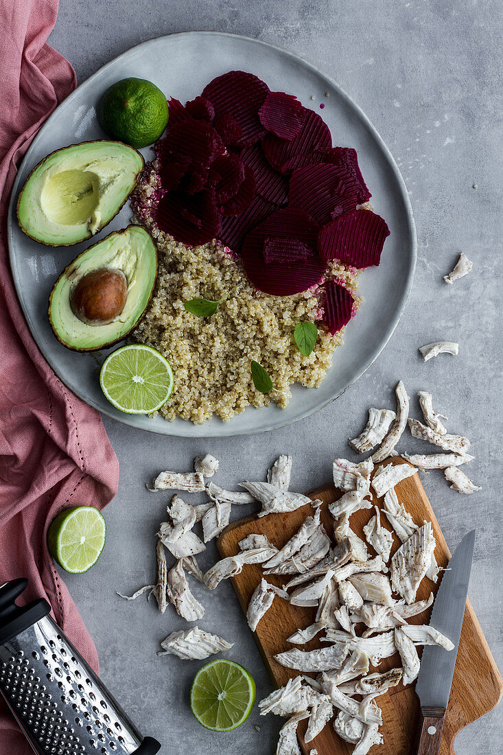Healthy dish with quinoa, beetroot and pulled chicken