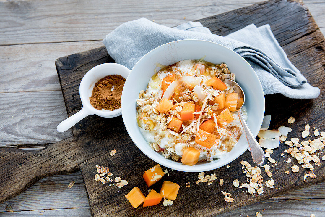 Muesli with cottage cheese and persimmon