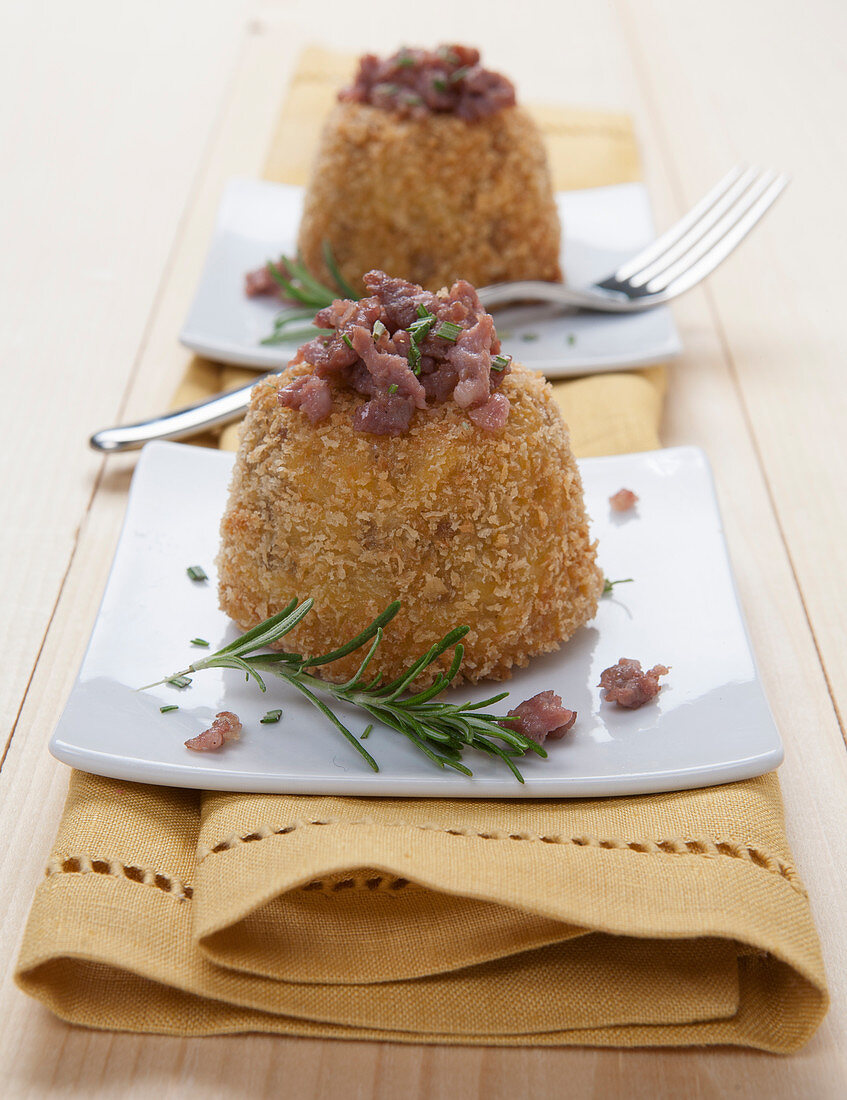 Fried minced meat cakes with rosemary