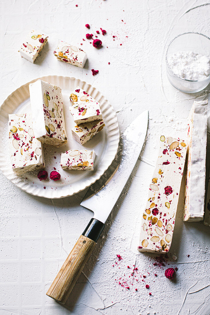 Cocoa butter nougat with raspberries and almonds