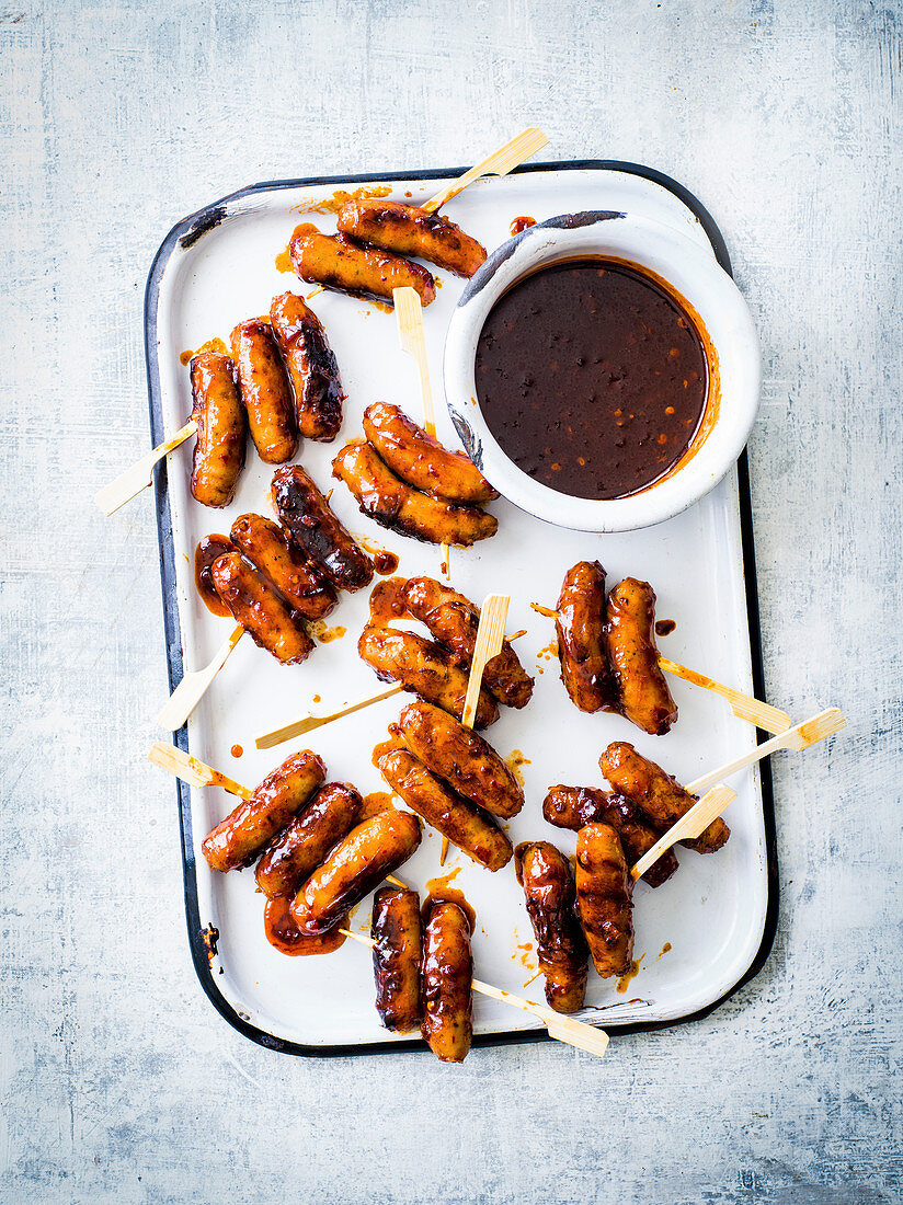 Harissa-honey sausage skewers