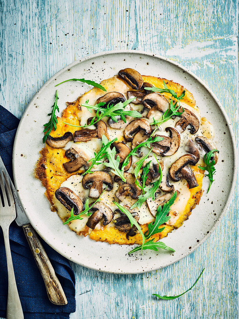 Open-faced omelette with garlic mushrooms and taleggio