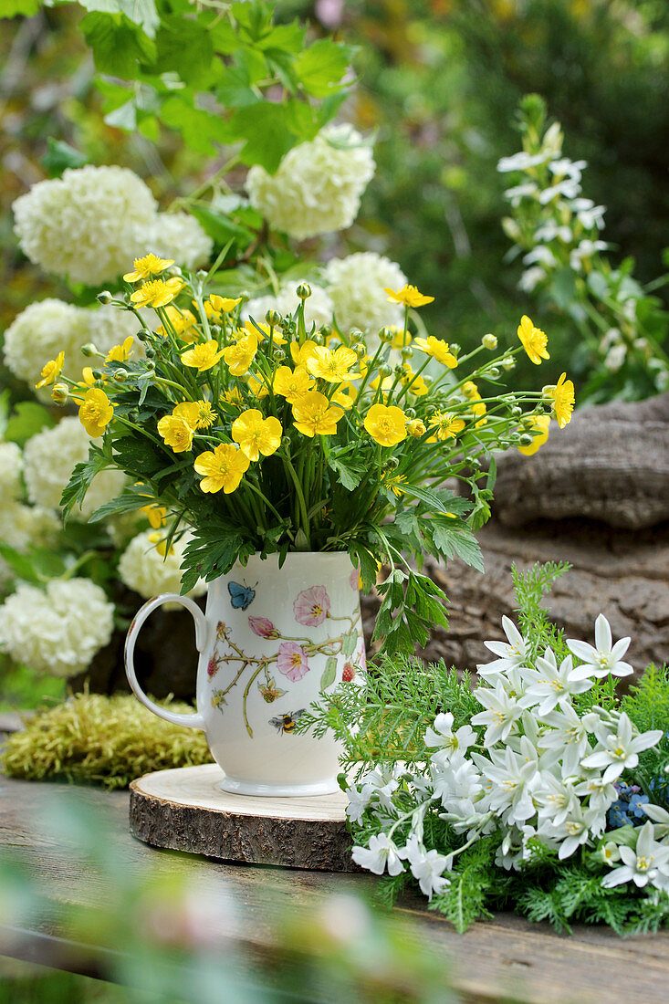 Bouquet of buttercups, Star-of-Bethlehem, feathery leaves and yarrow