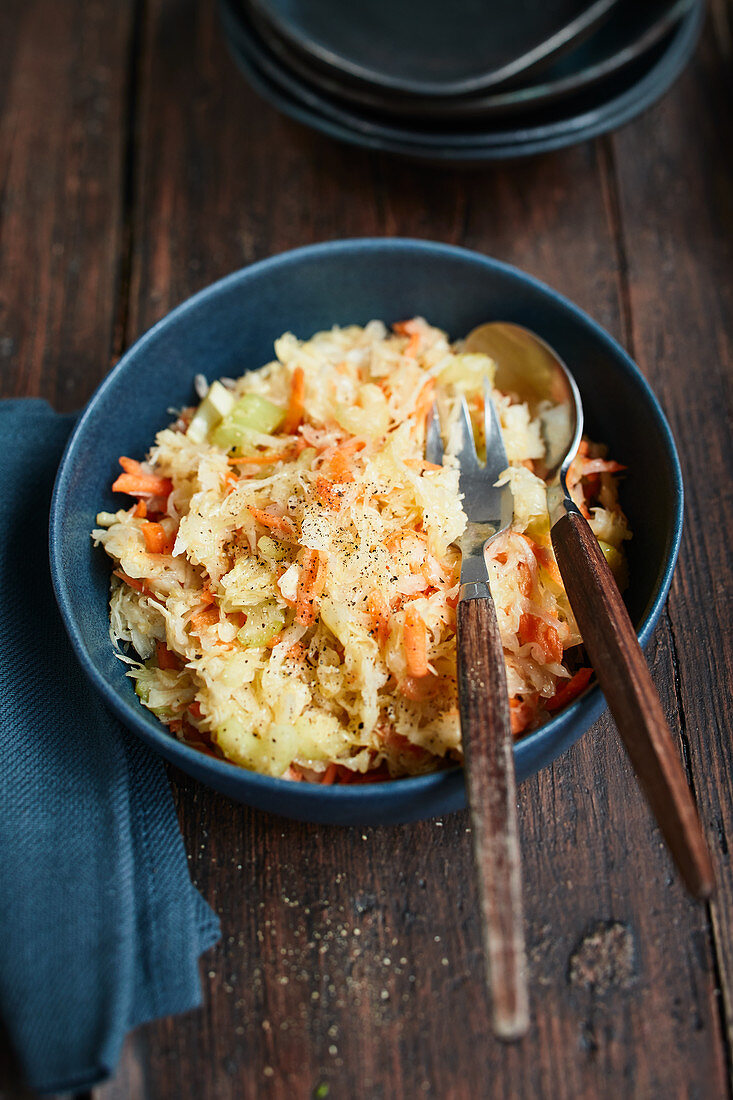 Coleslaw with carrots and celery sticks