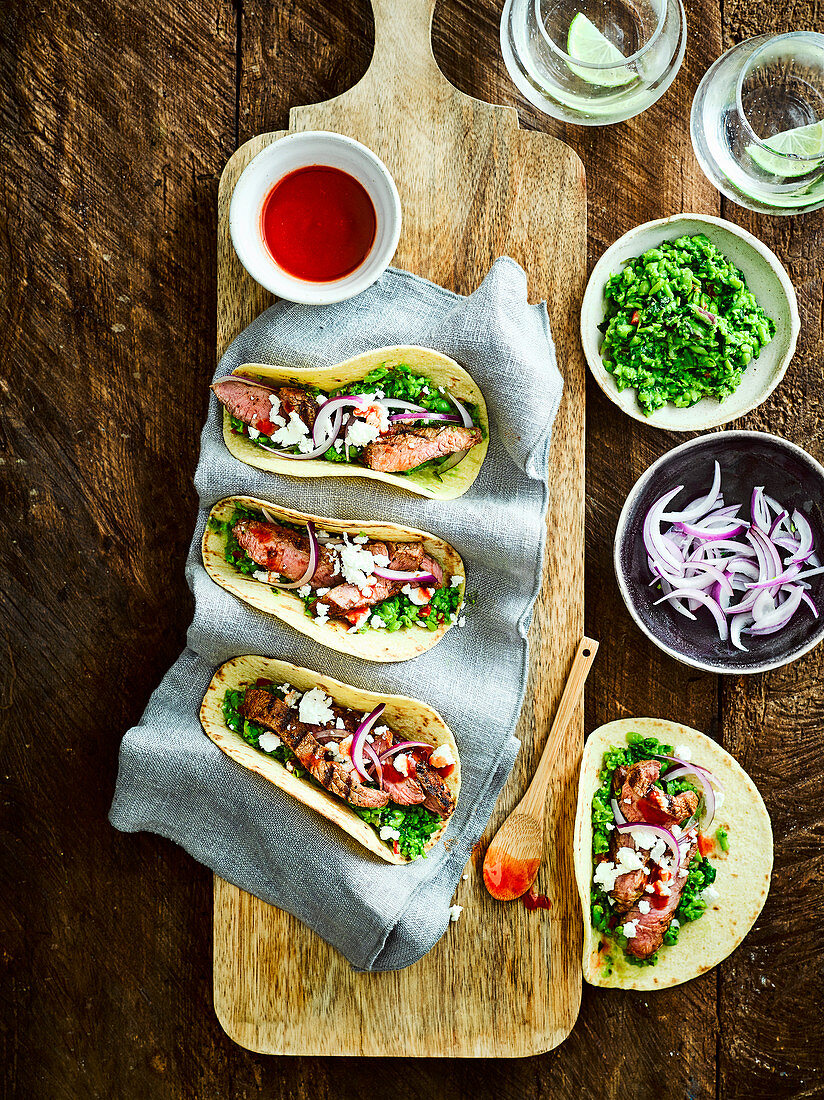 Lamb tacos with minted pea guacamole