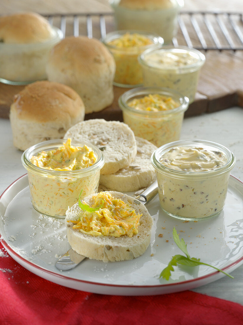 Bread baked in glasses with two types of butter