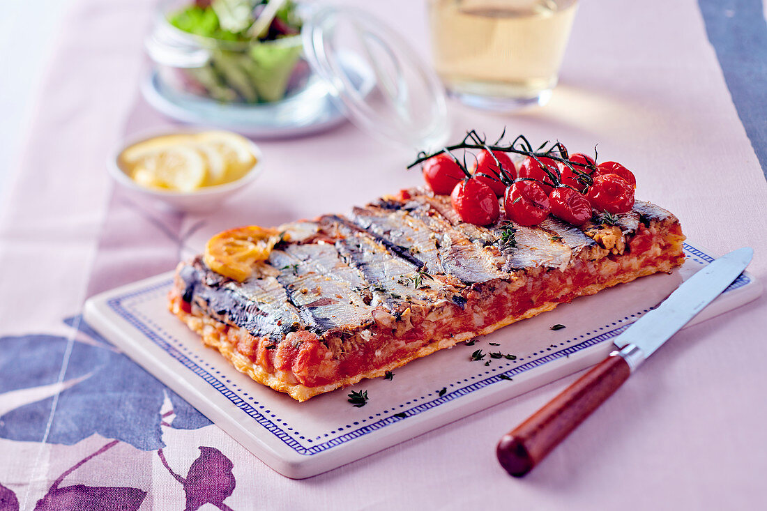 Upside down tart with sardines and cherry tomatoes