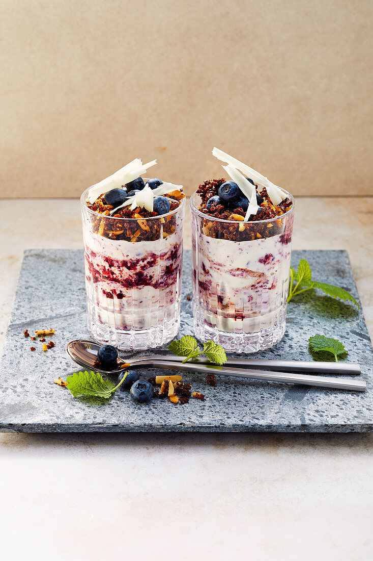 Blueberry and chocolate dream desserts with pumpernickel and almond crumbs
