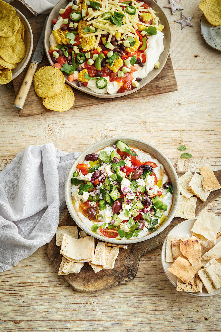 Loaded mexican dip and Loaded greek-style dip