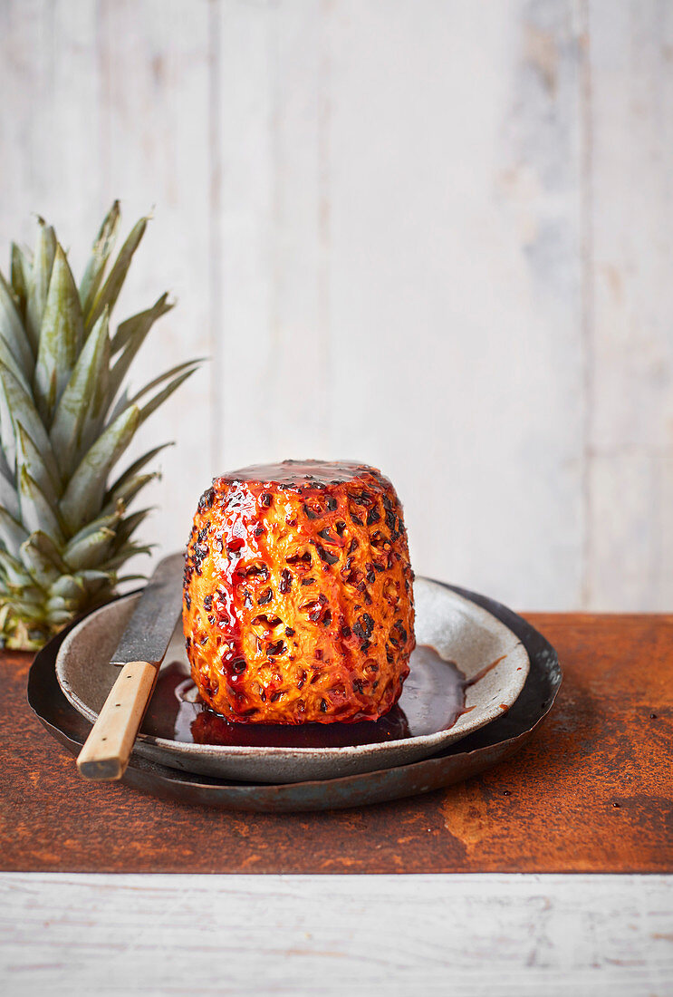 Whole roasted pineapple in spiced caramel