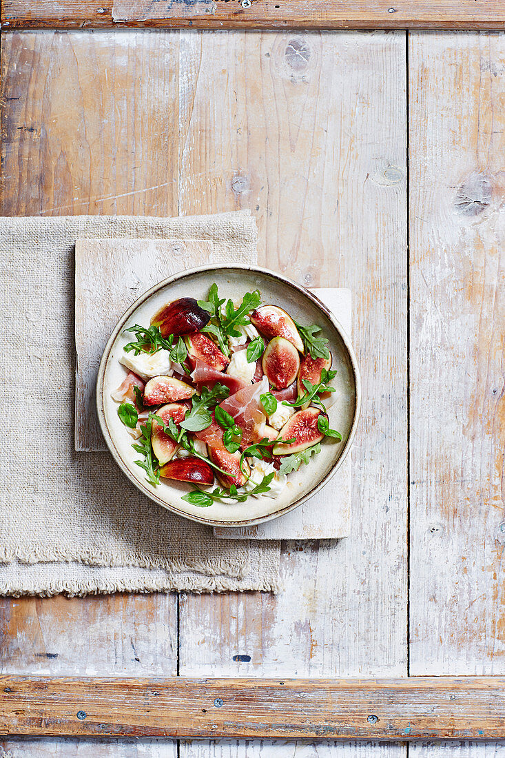 Marinated figs with mozzarella and serrano ham