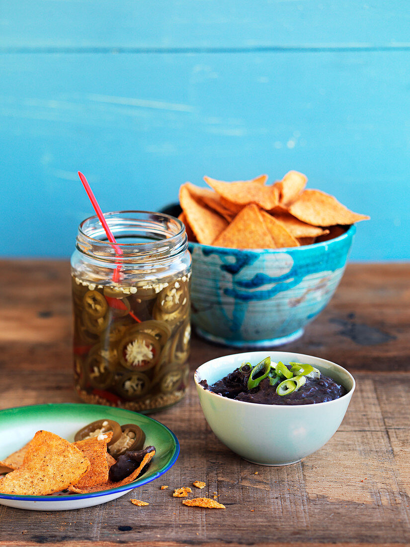 Texmex nachos with mole and pickled jalapenos