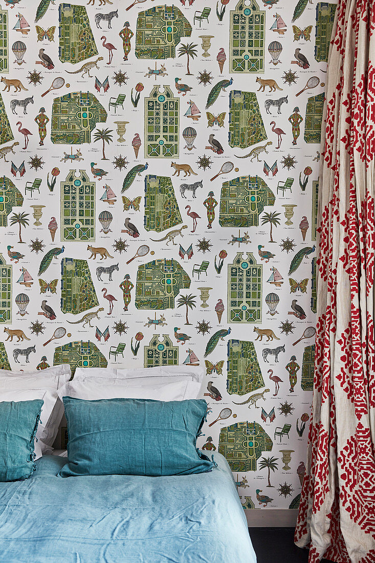 Vintage wallpaper with pattern of exotic objects in bedroom