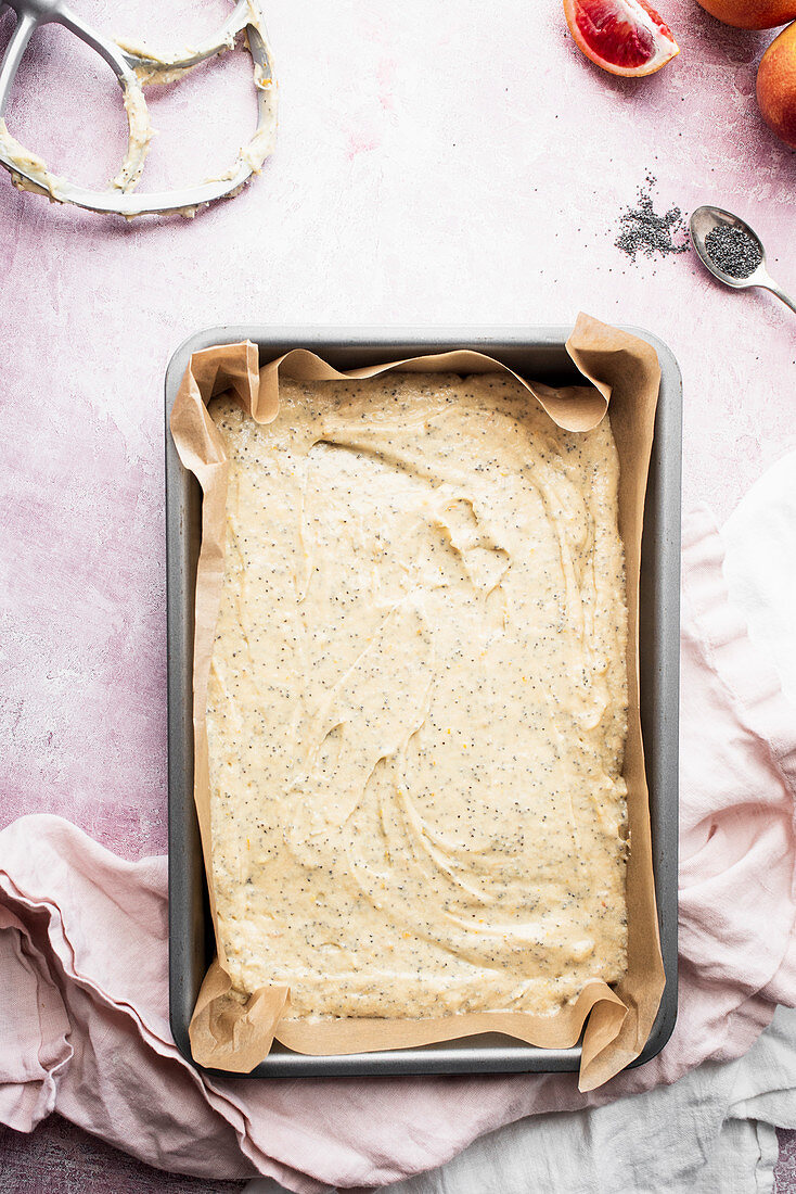 Preparing poppy seed blood orange cake