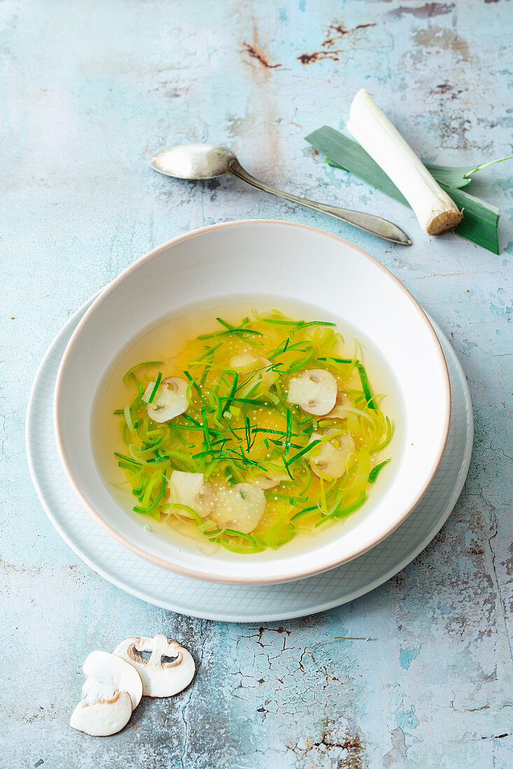 Consommé with mushrooms, leek and pearl sago