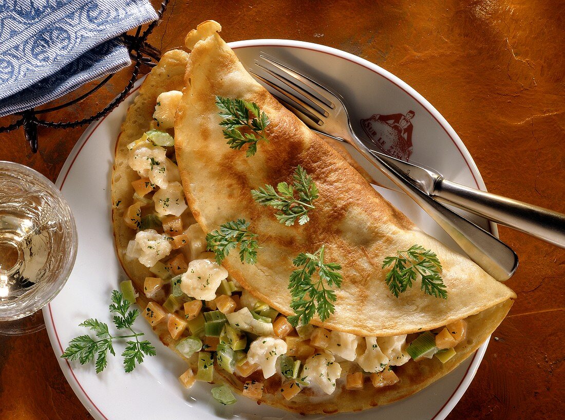 Potato crepes with vegetable filling 
