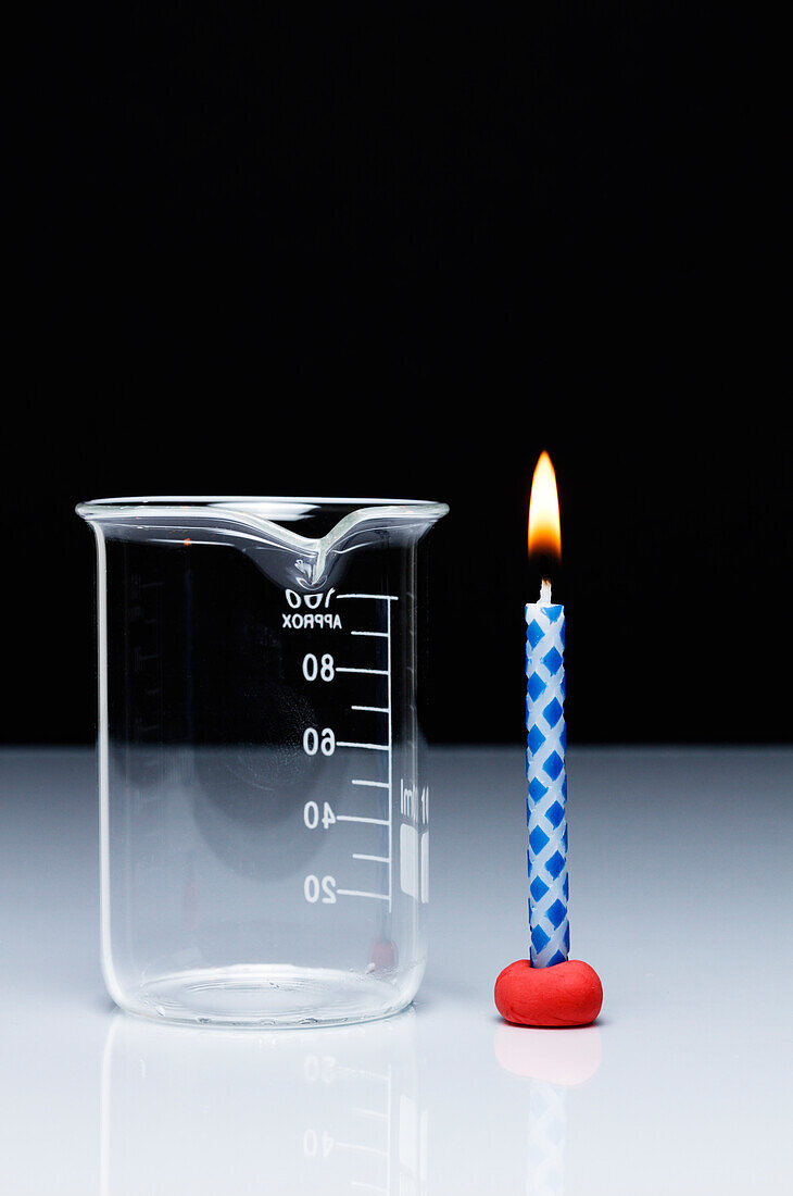 Carbon dioxide extinguishes flame, 1 of 2