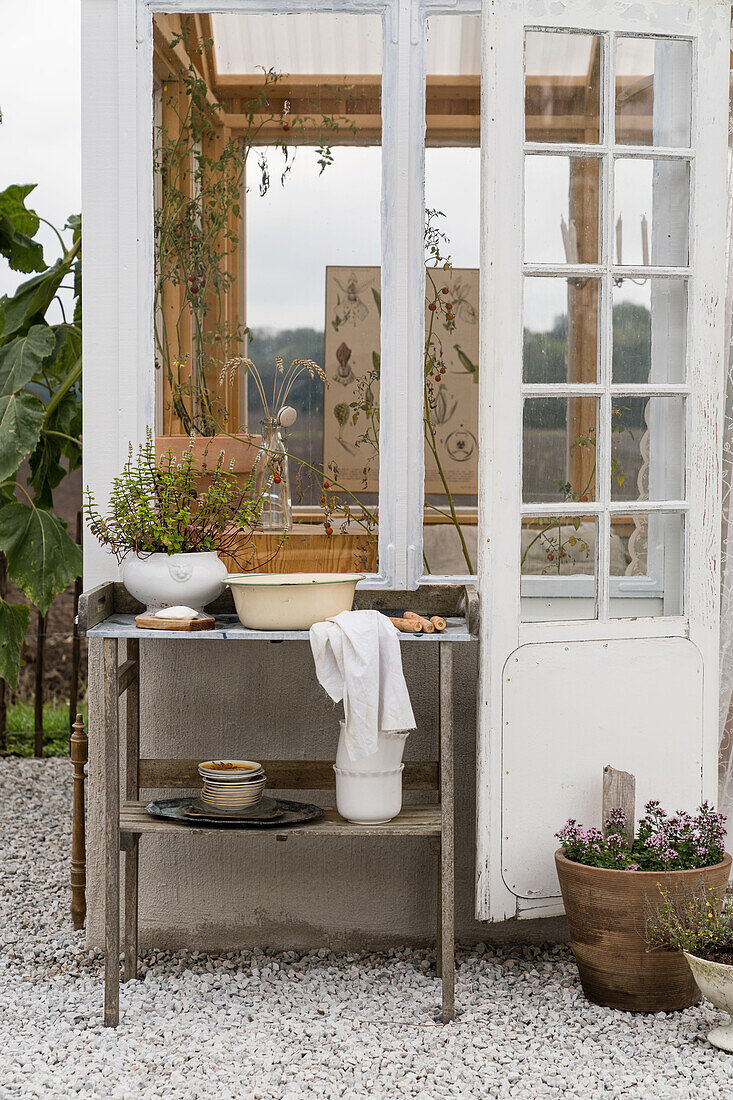 Old potting table outside greenhouse