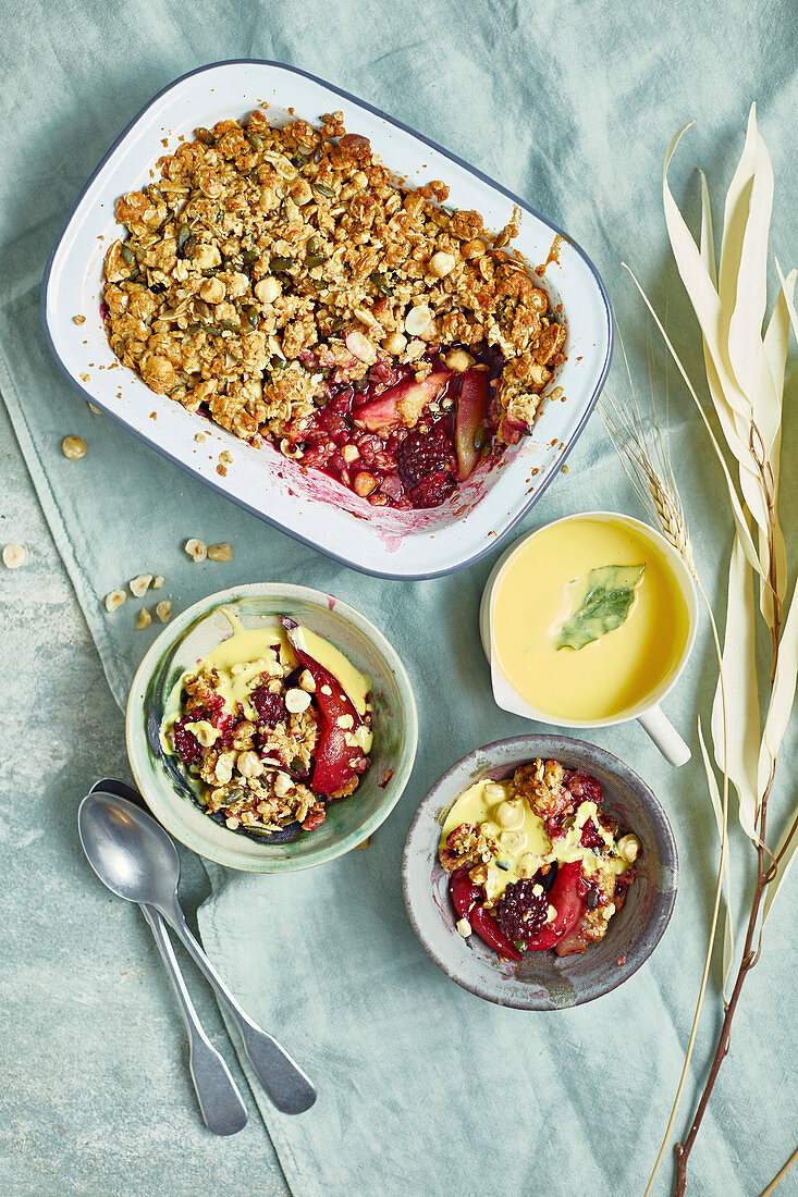 Pear and blackberry crumble with bay leaf custard