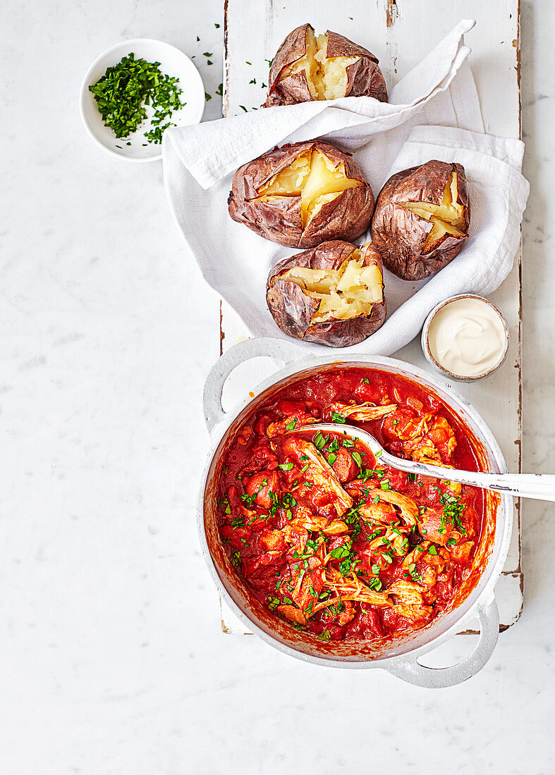 Coronation guinea fowl with jacket potatoes