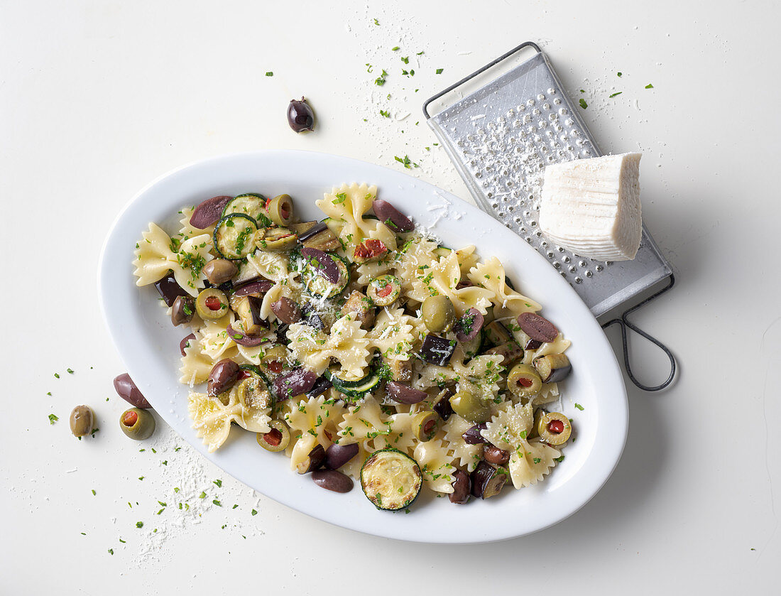 Farfalle with an aubergine and courgette sauce and olives