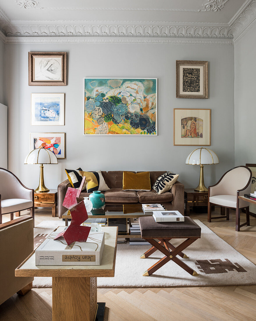 Classic living room in muted shades with stucco ceiling