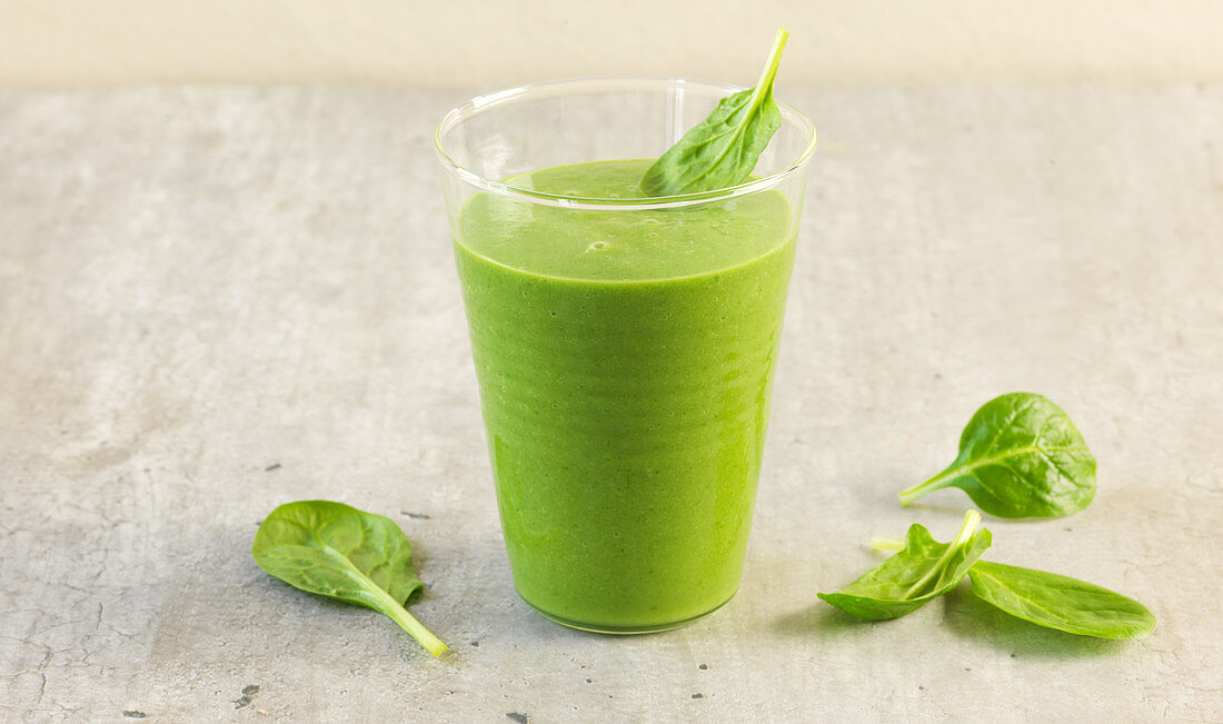 A green smoothie made from baby spinach, avocado, ginger and rice milk