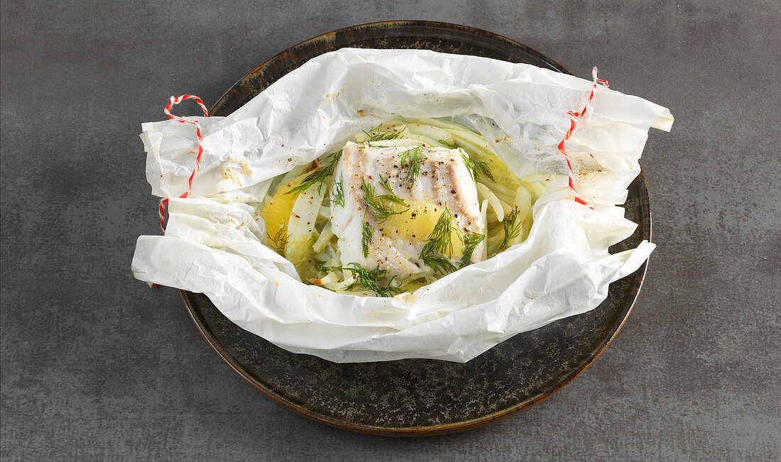 Cod baked in paper with a fennel medley