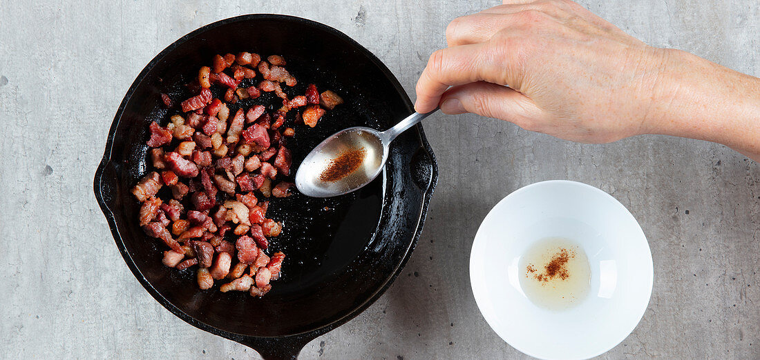 Bacon being fried (fat)