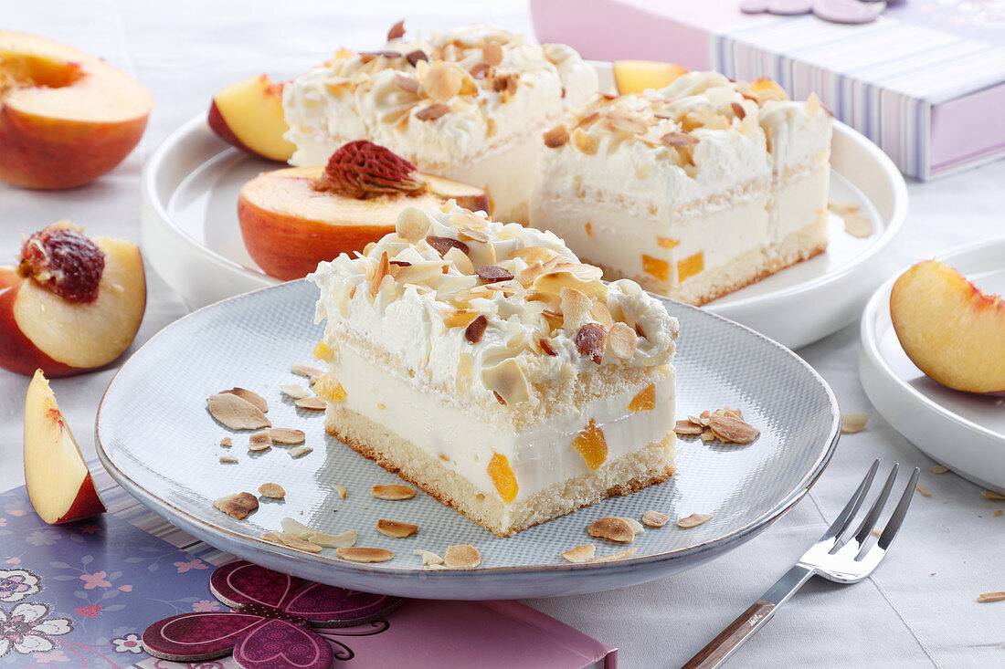 Creamy pie with peach pieces and almonds