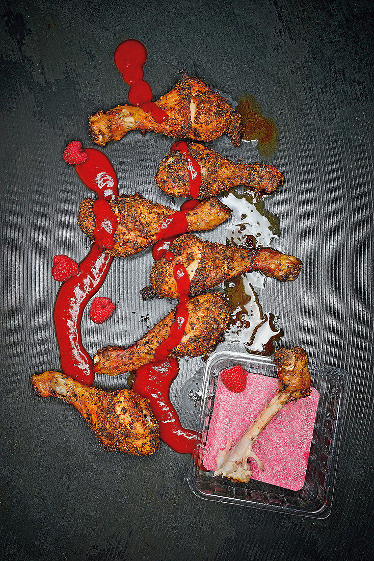 Spicy drumsticks with raspberry ketchup