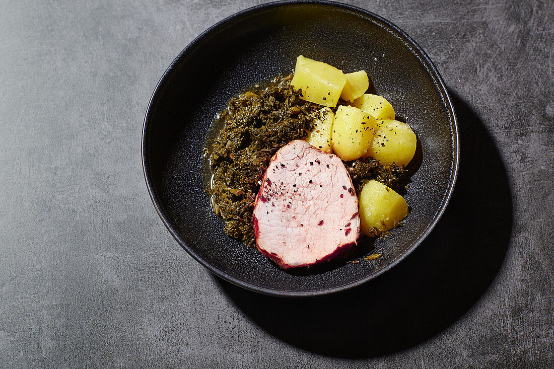 Smoked pork with kale and salted potatoes
