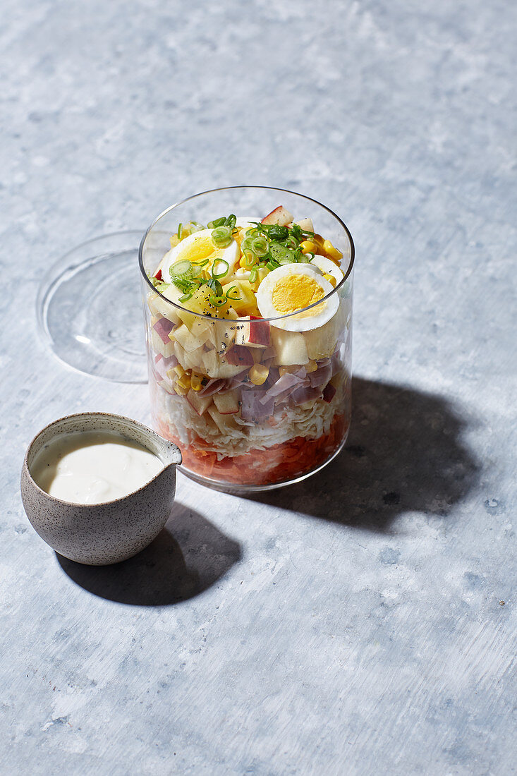A layered salad in a jar to go