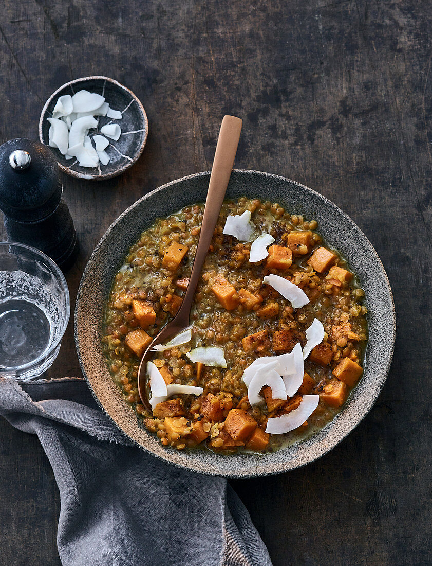 Lentil dhal with sweet potatoes, coconut milk and coconut crisps