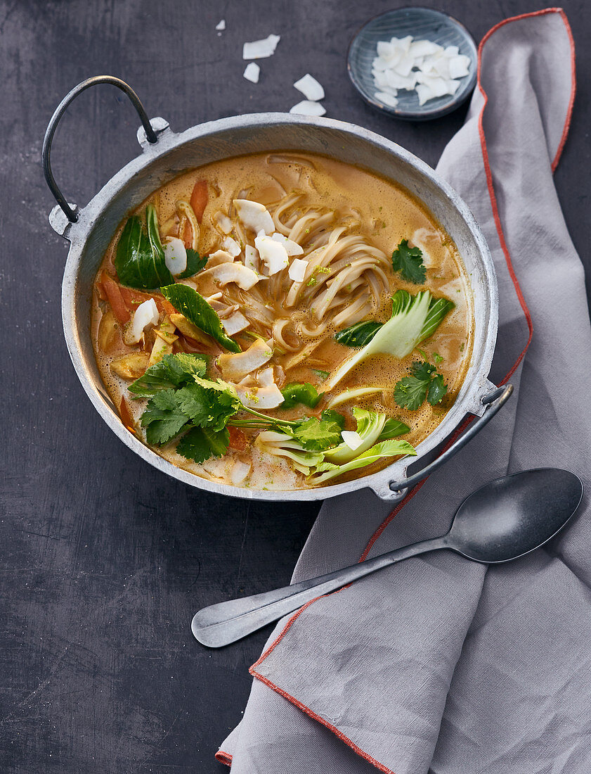 Thai coconut soup with bok choy and rice noodles