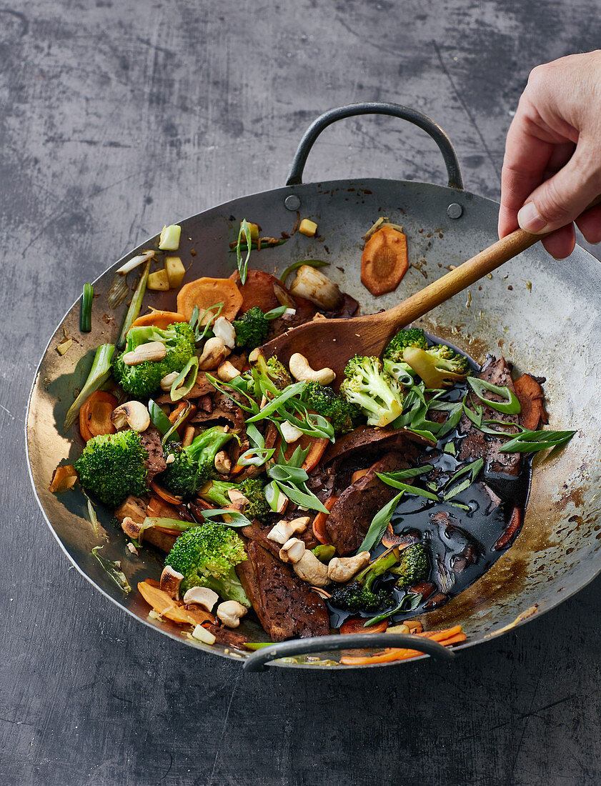 Stir-fried vegetables with grated tofu, cashew nuts and mirin rice wine