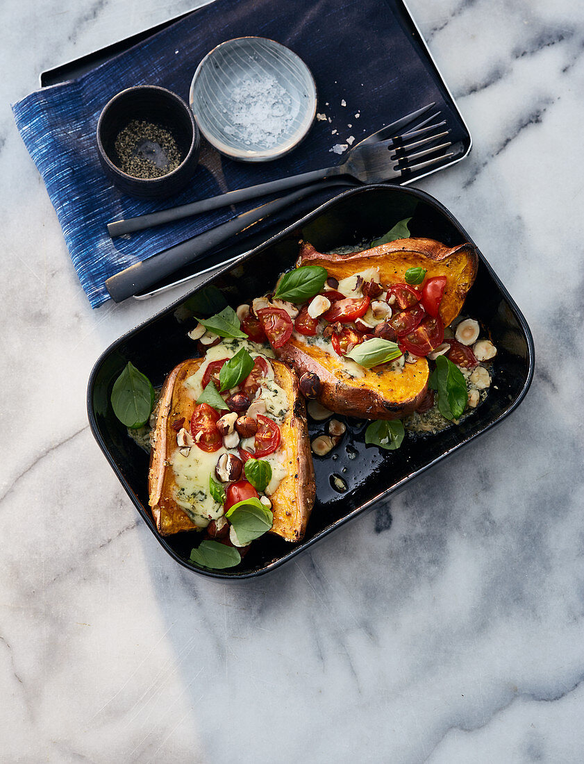 Gratinated sweet potatoes with blue cheese and nuts