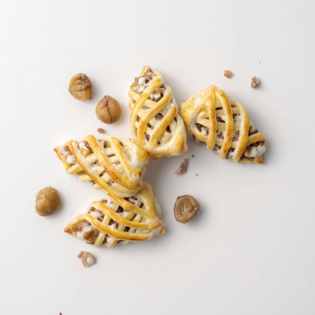 Puff pastry mini strudels with chestnuts, cheese and salsiccia